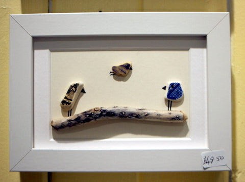 Three pottery birds